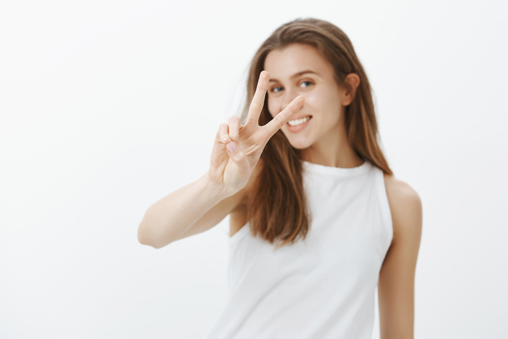 Happy-woman-putting-on-contact-lenses
